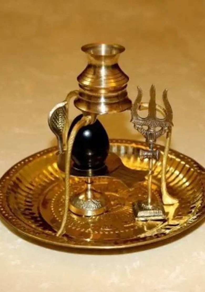 Yashodanandan Shaligram Shivling Stone Original With Shivling StandBrass Trishul Om Plate Set Decorative Showpiece - 10 Cm(Brass Brown) - Indya