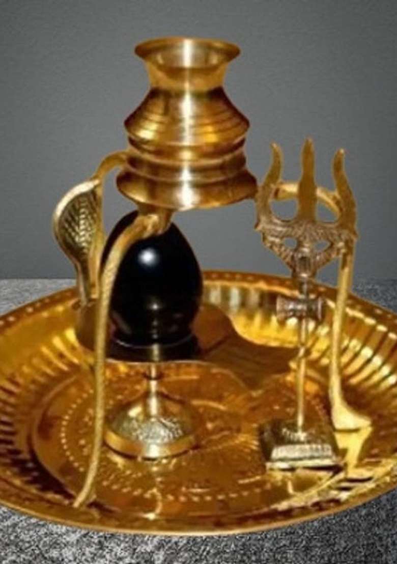 Yashodanandan Shaligram Shivling Stone Original With Shivling StandBrass Trishul Om Plate Set Decorative Showpiece - 10 Cm(Brass Brown) - Indya