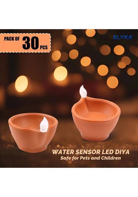 SLYKA LED Diya with Water Sensor Battery Powered For Temple Office/Home Decoration Plastic (Pack of 30) Table Diya Set(Height 1.6 inch)