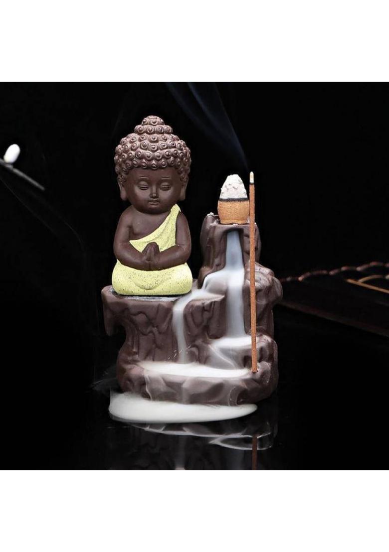 SSR Meditating Monk Buddha Smoke Back Flow Cone Incense Holder Decorative Showpiece with 10 free Smoke Back Flow Scented Cone Incenses Showpiece Orange Decorative Showpiece - 13 cm&nbsp;&nbsp;(Polyresin, Yellow, Brown) - Indya