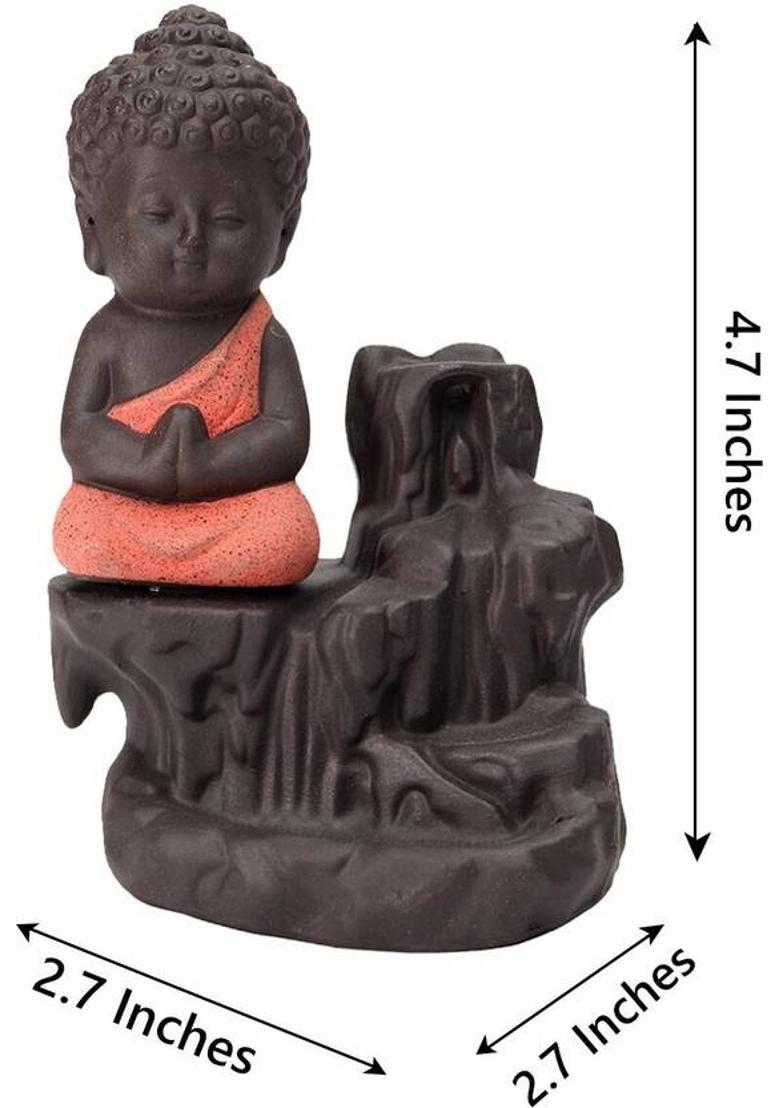 eCraftIndia Monk Buddha Statue Smoke Backflow Cone Incense Holder With 10 Cone Incenses Decorative Showpiece - 12 cm&nbsp;&nbsp;(Polyresin, Orange) - Indya