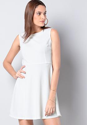 white sleeveless skater dress