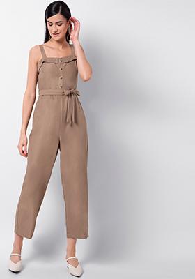 beige jump suit