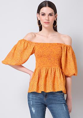 Yellow Dotted Smocked Peplum Top